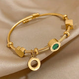 CABLE TWISTED CHARM MALACHITE AND NUMERAL ROMAN BRACELET | GOLD JEWELLERY