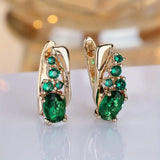 CLUSTER EMERALD OVAL STONES ROUND DANGLE EARRINGS | GOLD JEWELLERY