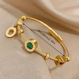 CABLE TWISTED CHARM MALACHITE AND NUMERAL ROMAN BRACELET | GOLD JEWELLERY