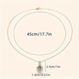 NECKLACE SAPPHIRE BLUE HALO TWO-TONE VINTAGE PENDANT | GOLD JEWELLERY