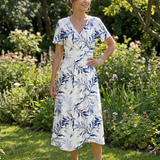 KAEL | V-AUSSCHNITT MIDI-KLEID MIT SANFTEM BOTANISCHEM DRUCK