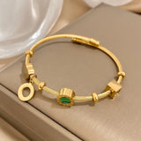 CABLE TWISTED CHARM MALACHITE AND NUMERAL ROMAN BRACELET | GOLD JEWELLERY