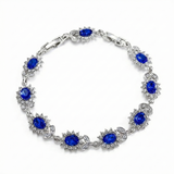 TENNIS FLOWER OVAL SAPPHIRE BLUE HALO PAVÉ BRACELET | SILVER JEWELLERY
