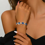 TENNIS TEARDROP SAPPHIRE BLUE HALO PAVÉ BRACELET | SILVER JEWELLERY