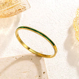 RIGIDE ZIRCONIA GREEN SQUARE EN CHANNEL BRACELET | GOLD JEWELLERY