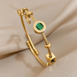 CABLE TWISTED CHARM MALACHITE AND NUMERAL ROMAN BRACELET | GOLD JEWELLERY