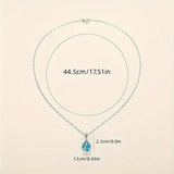 NECKLACE TEARDROP TOPAZ BLUE WRAP PAVÉ PENDANT | SILVER JEWELLERY