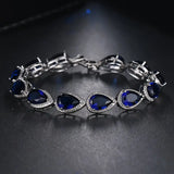 TENNIS TEARDROP SAPPHIRE BLUE HALO PAVÉ BRACELET | SILVER JEWELLERY