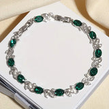 TENNIS STONES OVAL EMERALD TWIST PAVÉ BRACELET | SILVER JEWELLERY
